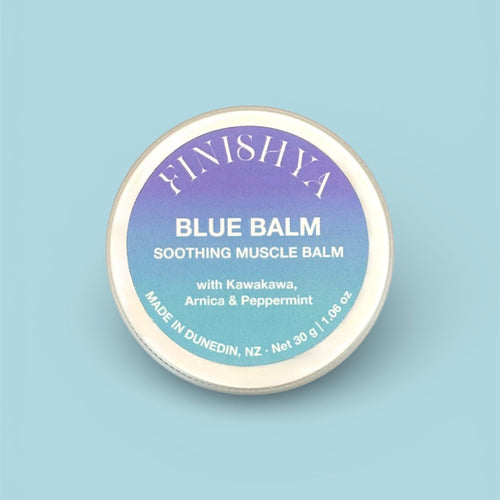 Close up of Finishya Blue Balm lid highlighting vegan and cruelty-free ingredients including Peppermint and Kawakawa, made in Dunedin, NZ.