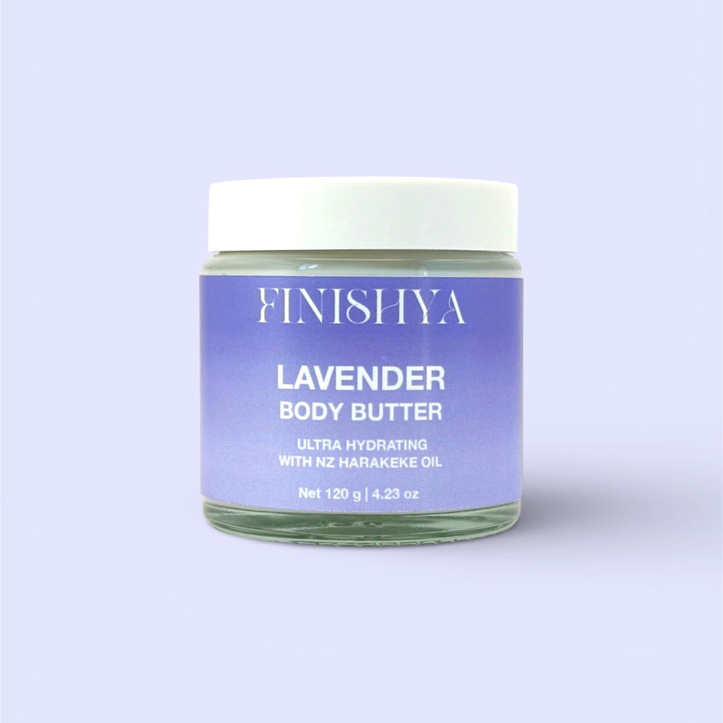Front view of Finishya Lavender Body Butter in a clear glass jar with a white lid. The purple label specifies "Ultra Hydrating with NZ Harakeke Oil" and "Vegan & Cruelty Free."