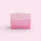 A single bar of Finishya Rose soap featuring a five-tiered pink ombre gradient design against a soft pink background.