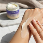 Finishya Vanilla Body Butter being applied to a hand, showing the smooth, non-greasy absorption on skin.