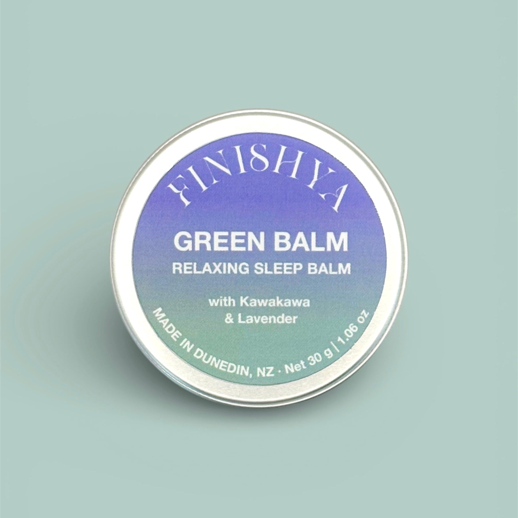 Close-up of Finishya Green Balm lid, a cruelty-free sleep support balm designed for evening relaxation routines.