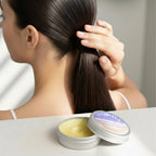 A woman styling a sleek, smooth ponytail with Finishya Grooming Balm to settle baby hairs.