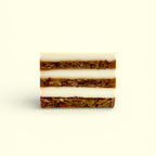 A single bar of Finishya Vanilla hand and body soap featuring distinct white and brown textured layers against a soft cream background.